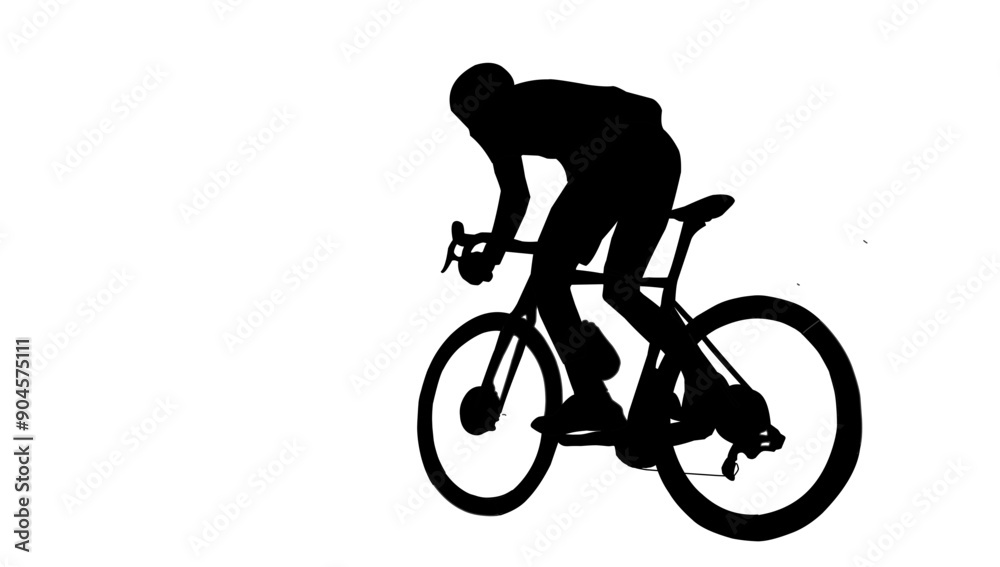 silhouette of a person riding a bicycle