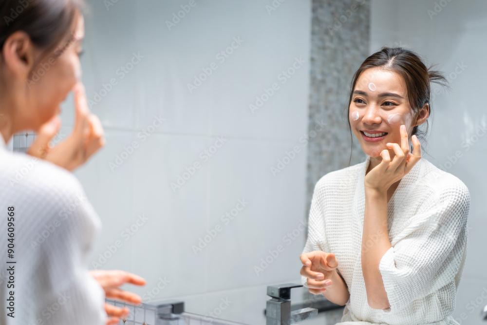 Asian beautiful woman putting smooth and skin care for facial soft. Asian beautiful woman putting smooth and skin care for facial soft.
