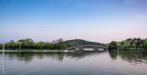 Tranquil Bridge Over Calm River Landscape