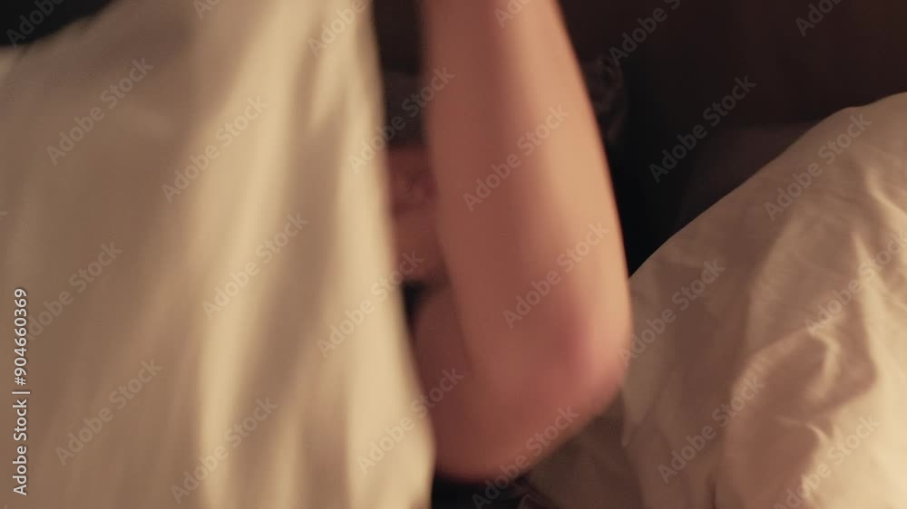 Night book. Tired young man falling asleep in a tranquil setting bathed in serene light deep in thought contemplation. Night book. Tired young man falling asleep in a tranquil setting bathed in serene light deep in thought contemplation.