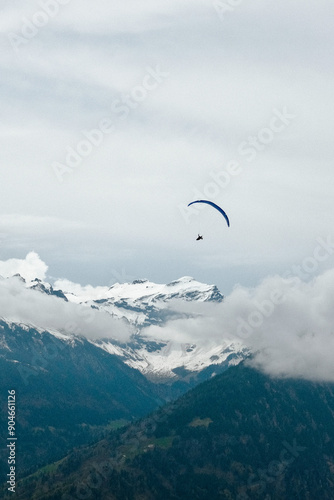 paraglider in the sky over the mountains in Switzerland