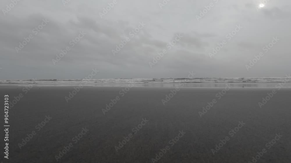 Ocean Waves At An Empty Beach With Dark Thunder Stormy Sky Ocean Waves At An Empty Beach With Dark Thunder Stormy Sky