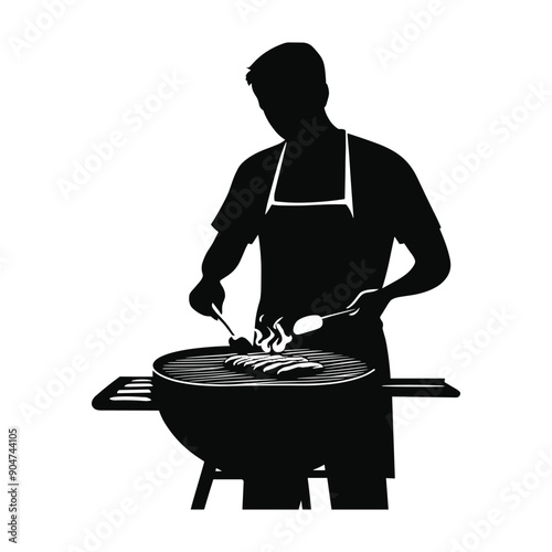 Silhouette of a man grilling food on a barbecue.