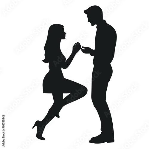Silhouette of a man proposing to a woman.