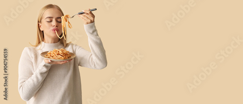 Young woman eating tasty pa...