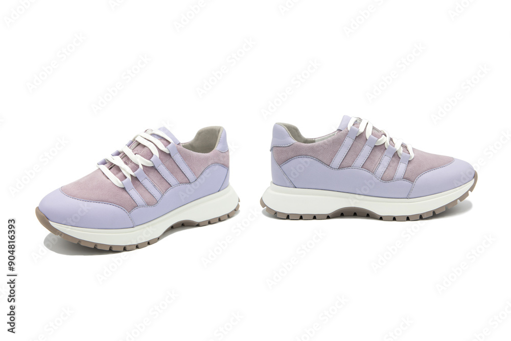 Sneakers. Pair of fashionable leather with suede inserts shoes isolated on white background. Sneakers. Pair of fashionable leather with suede inserts shoes isolated on white background.