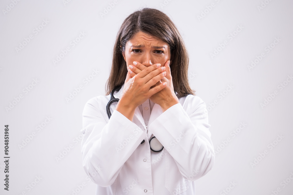 Portrait of anxious doctor who is overworked and exhausted. Portrait of anxious doctor who is overworked and exhausted.