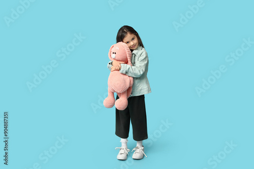 Cute little girl in stylish...