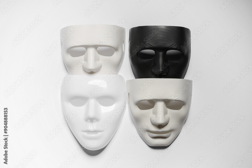 Theater arts. Many masks on white background, top view Theater arts. Many masks on white background, top view