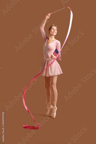 Female gymnast with ribbon,...