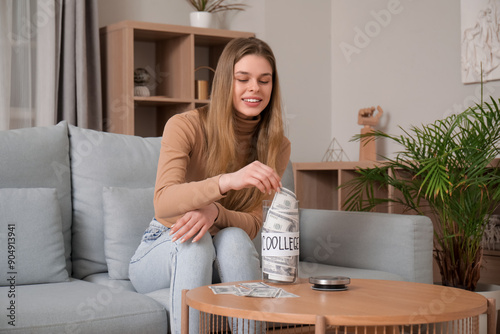Female student on sofa with...