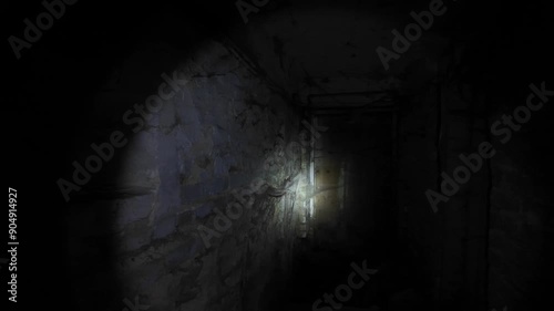 Flashlight in Scary underground, basement. Old abandoned warehouses in a dungeons.
