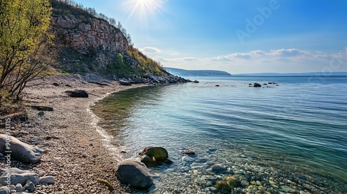 A seashore on a sunny spring day in Artem, Primorye, Russia. photo