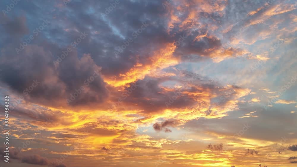Shot of a golden sunset as the clouds pass.