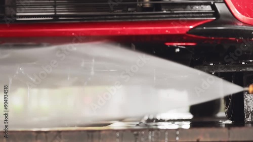 Powerful, high-pressure water jet blasts away dirt, grime, and salt from a car's undercarriage