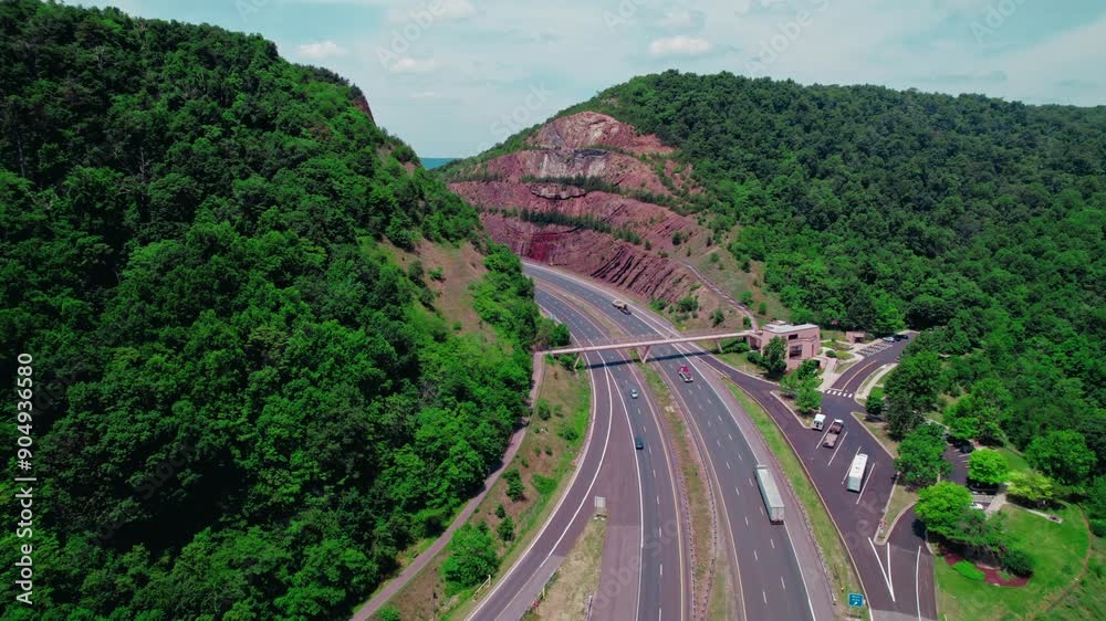 Epic aerial following semi truck driver with dry van trailer between hills in Maryland USA. Sliding Hill. Epic aerial following semi truck driver with dry van trailer between hills in Maryland USA. Sliding Hill.