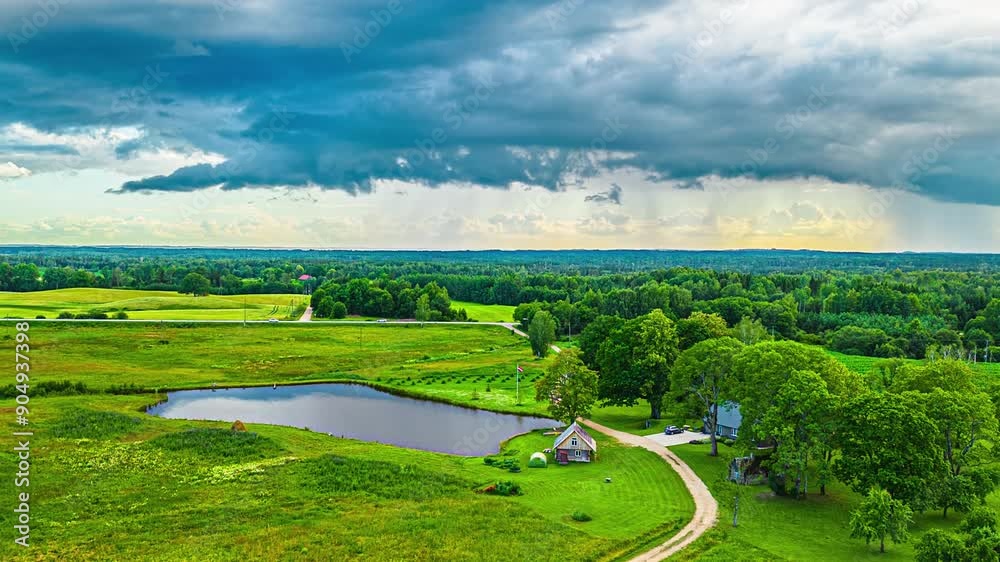 Rainy weather over farmland fields - pullback aerial hyper lapse reveal Rainy weather over farmland fields - pullback aerial hyper lapse reveal
