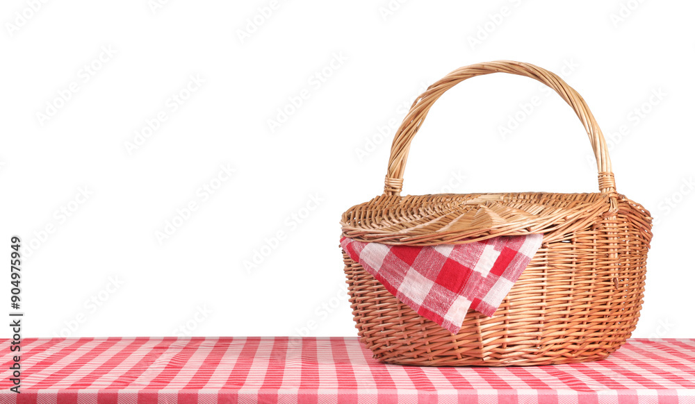 One picnic basket with napkin on table against white background. Space for text One picnic basket with napkin on table against white background. Space for text