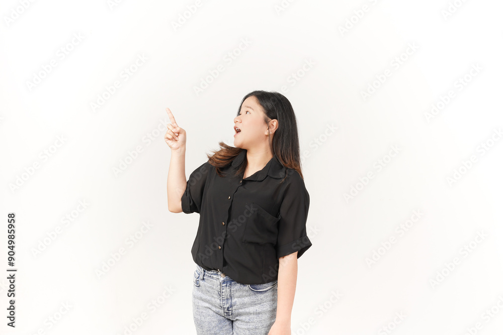 Young Asian woman presenting and pointing side copyspace wearing Black t-shirt and jeans isolated on white background Young Asian woman presenting and pointing side copyspace wearing Black t-shirt and jeans isolated on white background