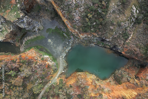 Fotografie Top down view of the old abandoned Barrington Quarry in Ellis Brook Valley Reser