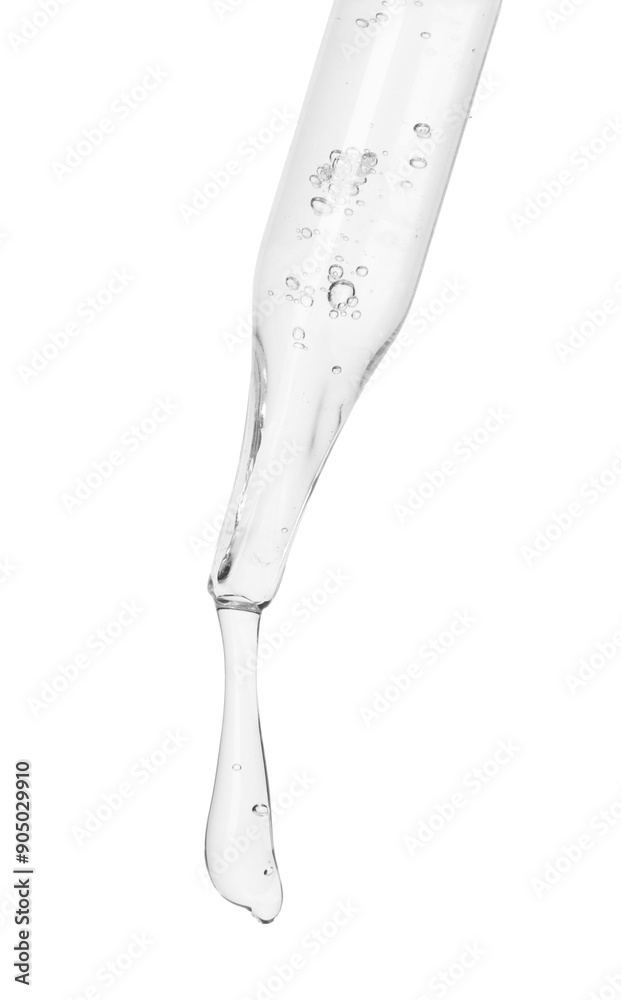 Dripping cosmetic serum from pipette on white background Dripping cosmetic serum from pipette on white background