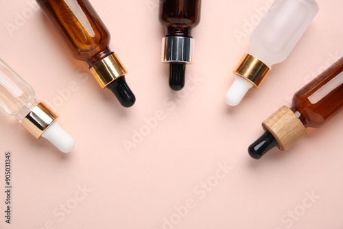 Different cosmetic products on beige background, flat lay. Space for text