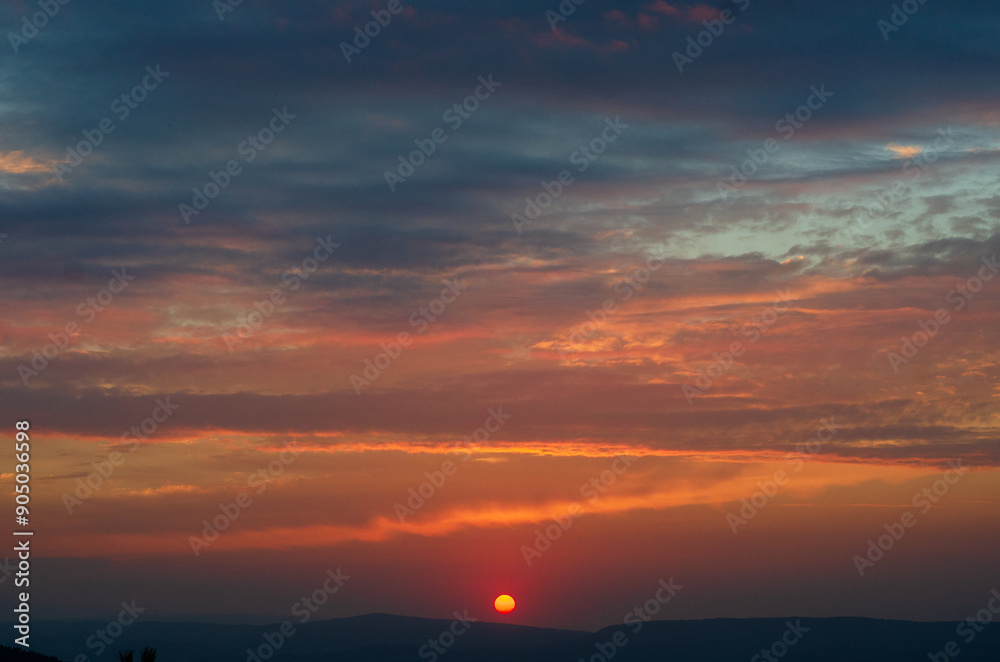 Dark Dramatic Sky Horizon Epic Sunset Clouds Landscape with Black Floor. Red sun, gradient sky high quality photo. Dark Dramatic Sky Horizon Epic Sunset Clouds Landscape with Black Floor. Red sun, gradient sky high quality photo.