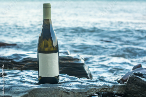 Bottle of wine by the sea