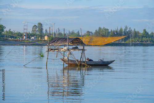 landscape of life and houses next to Thu Bon river in Hoi An ancient town, Quang Nam Province, Vietnam. Hoi An is one of the most popular destinations in Vietnam.