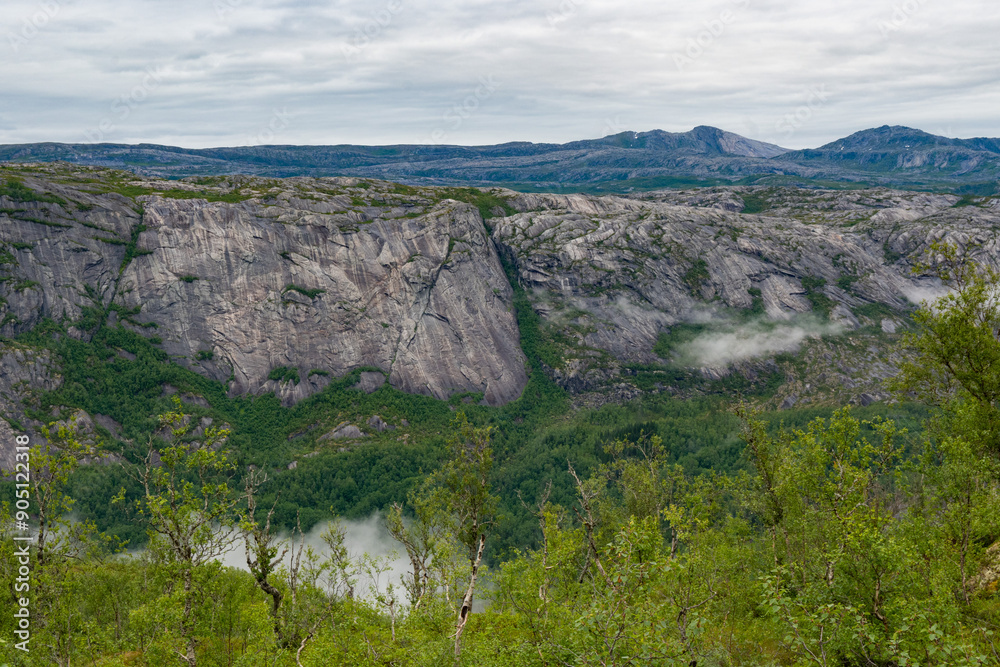 Wilderness forest, mountain and river landscape in Northern Norway at Rago national Park Wilderness forest, mountain and river landscape in Northern Norway at Rago national Park