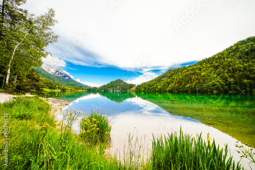 Landscape at Hintersteiner See near Scheffau in Tyrol. Idyllic nature at the mountain lake in the Wilder Kaiser nature reserve in Austria.
 photo