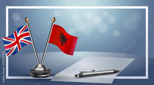 United Kingdom and Albania Small national flag on bokeh background, cooperative relationship