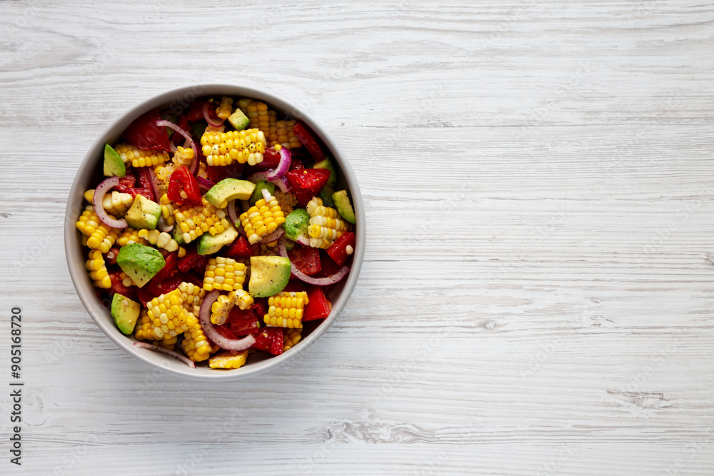 Healthy Fresh Corn Salad in a Bowl, top view. Flat lay, overhead, from above. Copy space. Healthy Fresh Corn Salad in a Bowl, top view. Flat lay, overhead, from above. Copy space.