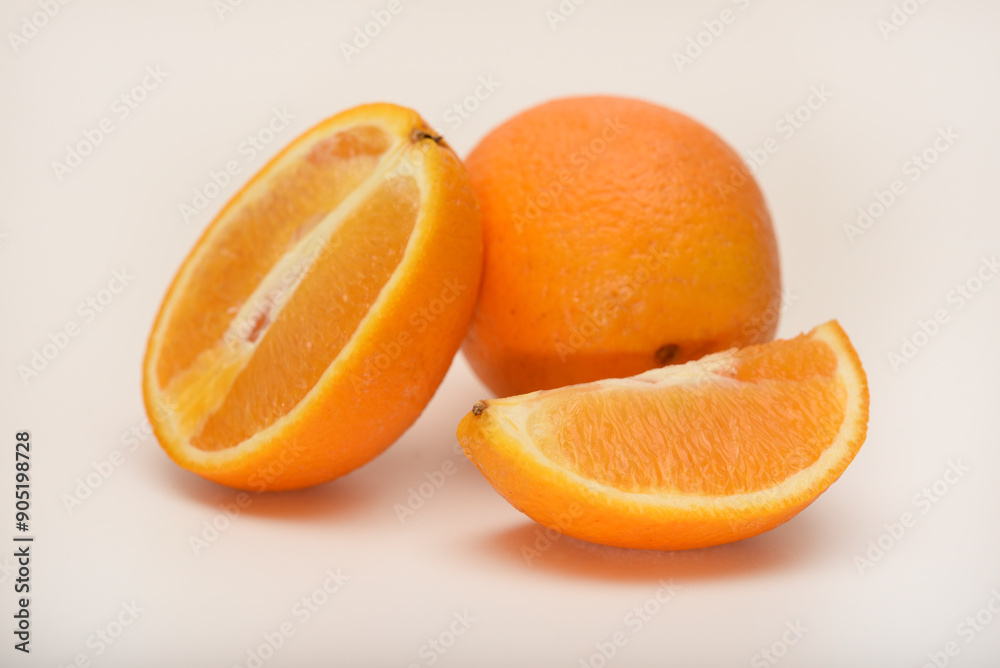 Oranges on a white background. Chopped fruits. Oranges on a white background. Chopped fruits.