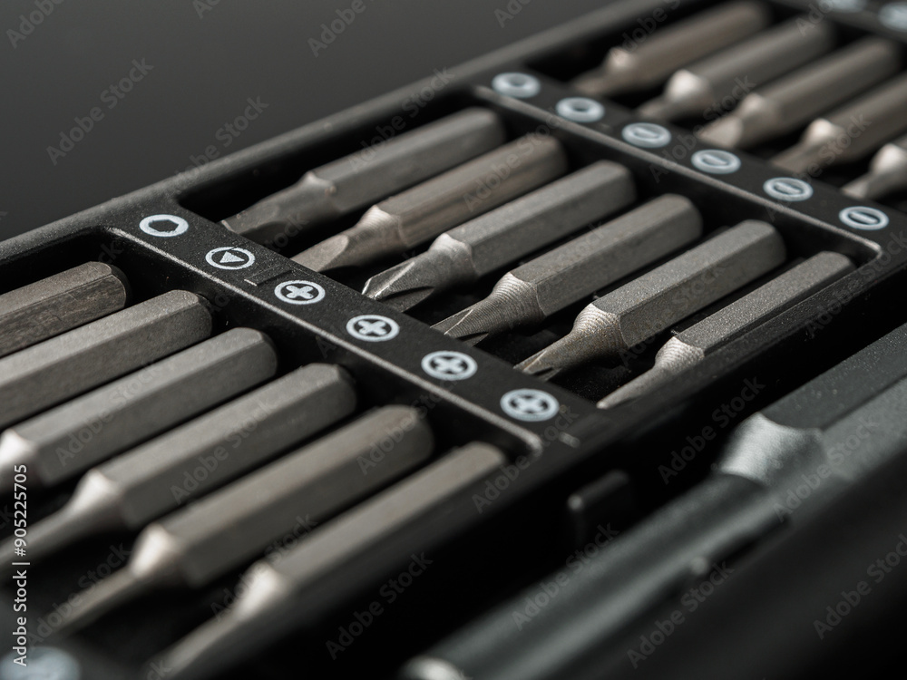 Close-up of various screwdriver heads (bits) ideal for repairing and assembling electronics and appliances Close-up of various screwdriver heads (bits) ideal for repairing and assembling electronics and appliances