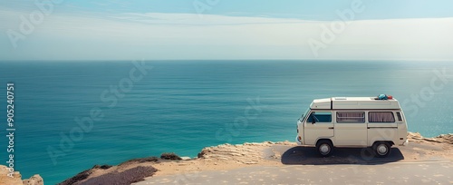 Modern camper van parked on a cliff overlooking a bright, expansive ocean view, capturing the essence of minimalist travel and adventure