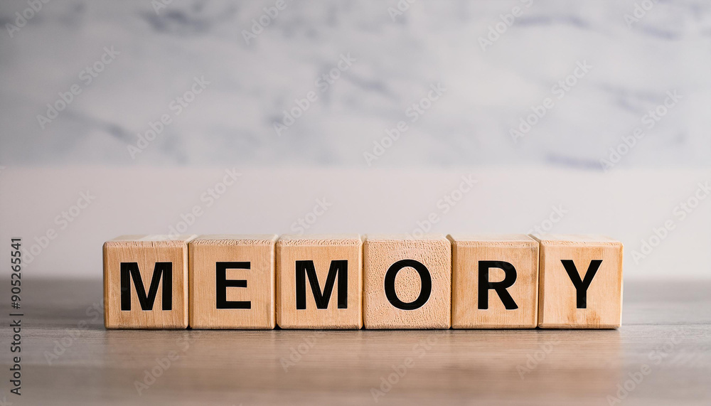 Wooden cubes with word MEMORY on table against light gray background. Wooden cubes with word MEMORY on table against light gray background.