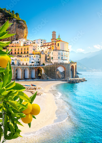 Obraz na płótnie Beautiful view of Amalfi on the Mediterranean coast with lemons in the foreground, Italy
w salonie