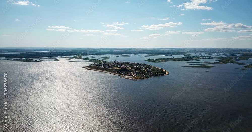 Island with a small town in the middle of the river