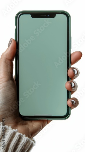 Hand holding smartphone with blank green screen isolated on white background. Mobile technology mockup concept