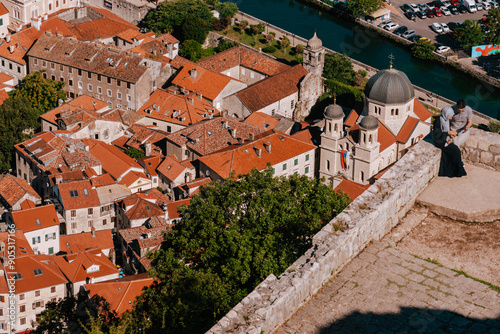 Unrecognizable Couple on Viewpoint of Kotor Fortress photo