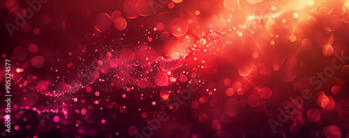 A deep crimson background with soft, blurred edges and glowing highlights in shades of red and orange, creating a dreamy and atmospheric effect.