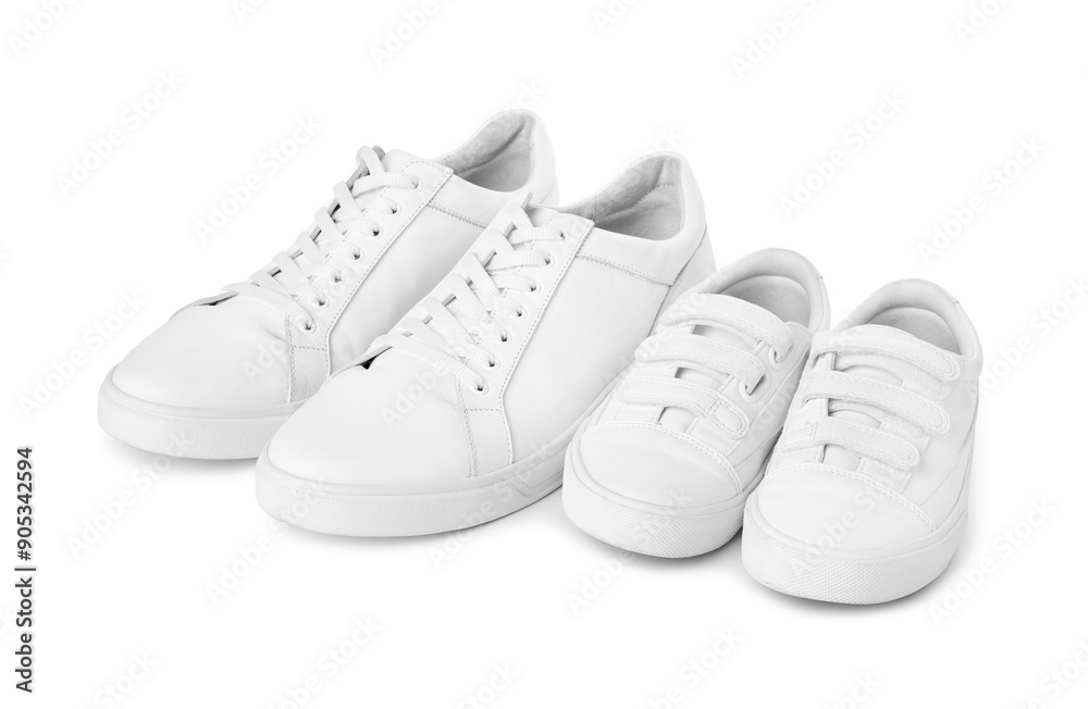 Big and small sneakers isolated on white Big and small sneakers isolated on white