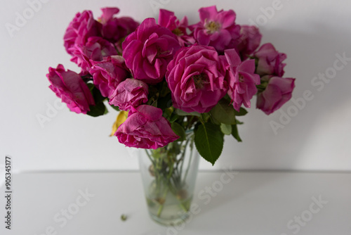 wilted roses in a vase