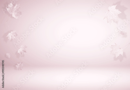 Fotografie Autumn leaves in air on pastel background, toned in pink color