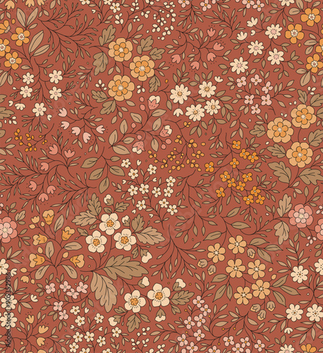 Cute floral pattern in the small flowers. Seamless vector texture. Elegant template for fashion prints. Printing with small orange and white flowers. Terracotta background.