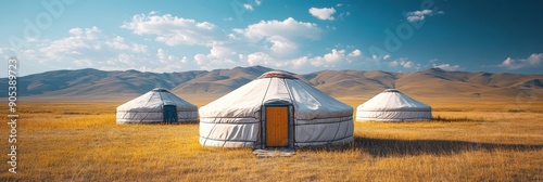 Three traditional Mongolian yurts on a grassland with mountains in the background, illustrating nomadic lifestyle and natural beauty.