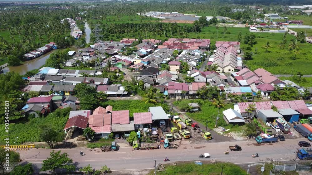 Aerial view of subsidized housing that looks dense and full of residents' activities