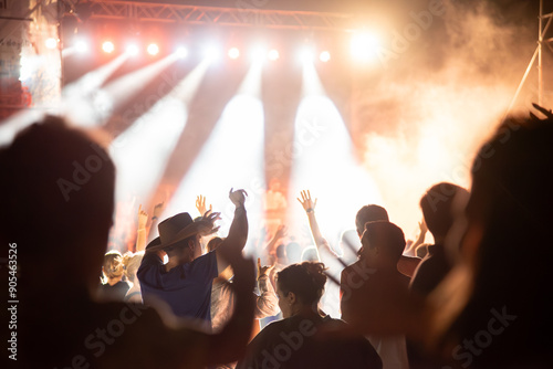 a concert stage where people are having fun dancing and listening to music