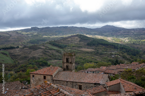 View from above of the village roofs, with the green mountains in the background, Santa Flora, Monte Amiata, Grosseto, Italy photo